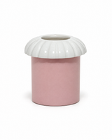 Porcelain candle topper in Fog, a white color, with ridged edges, resting on a jar candle in a pink vessel, shown on a white background.