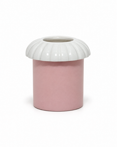 Porcelain candle topper in Fog, a white color, with ridged edges, resting on a jar candle in a pink vessel, shown on a white background.