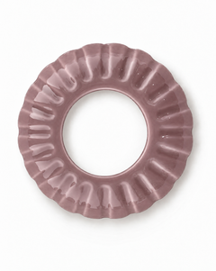 Dusty rose colored porcelain candle topper with ridged edges and an open center, shown from directly above on a white background.